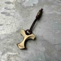 Ostap-Hel-Mijolnir-II-Antique-Brass-04-scaled.jpeg